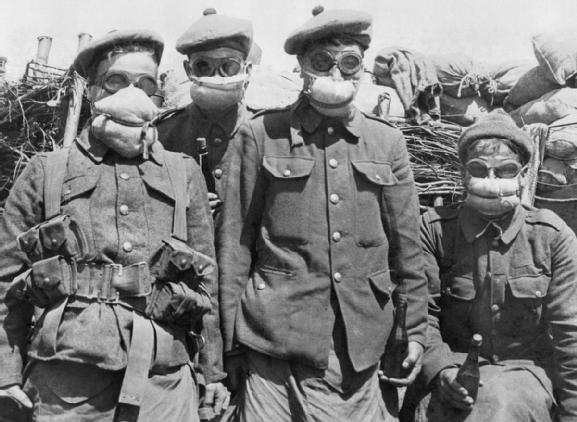 Soldiers wearing early gas masks.jpg