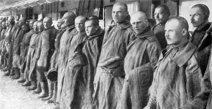 8.1.b Russian prisoners being bathed  shaved and fumigated by German captors