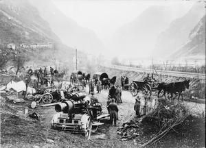 THE BATTLE OF CAPORETTO, OCTOBER-NOVEMBER 1917 (Q 60403) German horse-drawn transport convoy passing an Austro-Hungarian 30.5 cm Skoda heavy howitzer near Flitsch (Bovec) in the River Isonzo valley. Copyright: © IWM. Original Source: http://www.iwm.org.uk/collections/item/object/205081918
