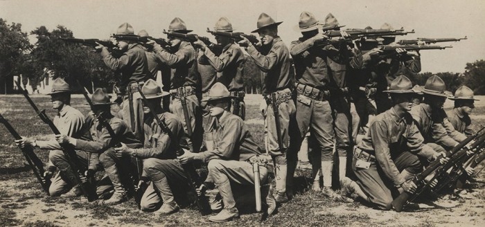 21.7aa soldiers-posed-with-guns