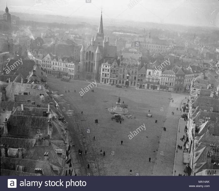 A2 the-grand-place-of-tournai-9-november-1918-note-damage-to-the-pave-and-overturned-german-sentry-box-MA14AK
